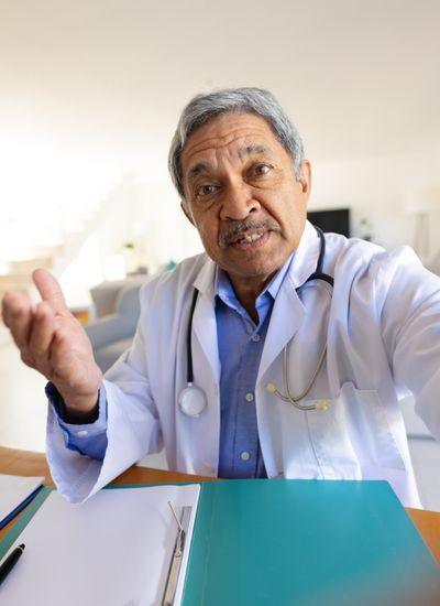 Doctor conducting video call